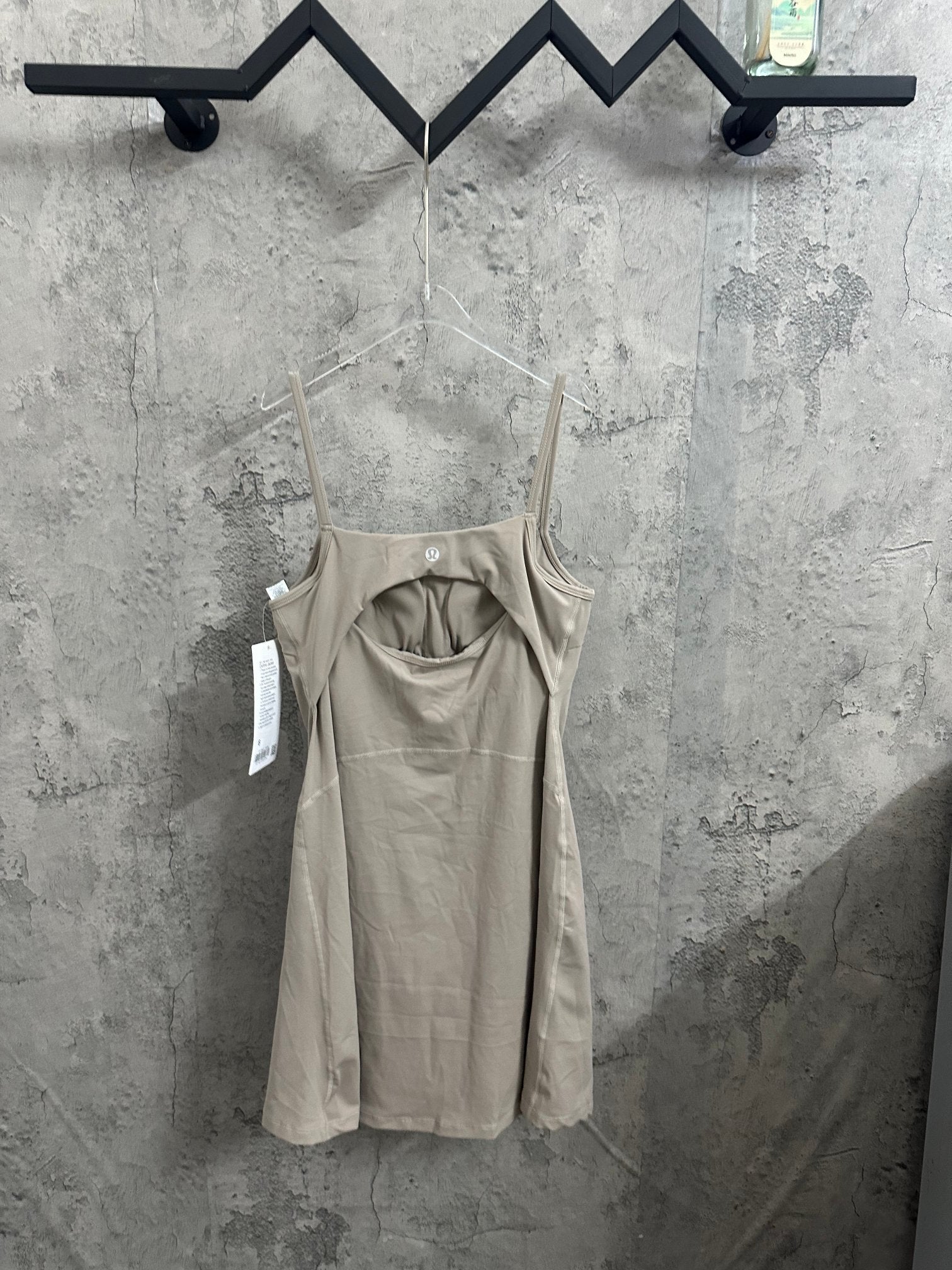 Ralph Lauren sleeveless beige dress with gathered bodice and thin shoulder straps, front
