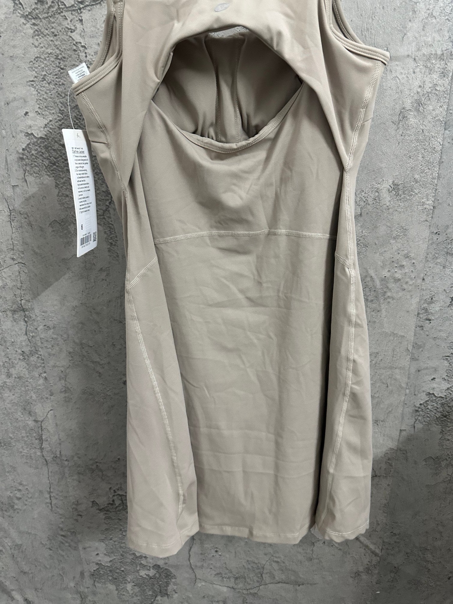 Ralph Lauren sleeveless beige dress back view with open scoop back and interior lining