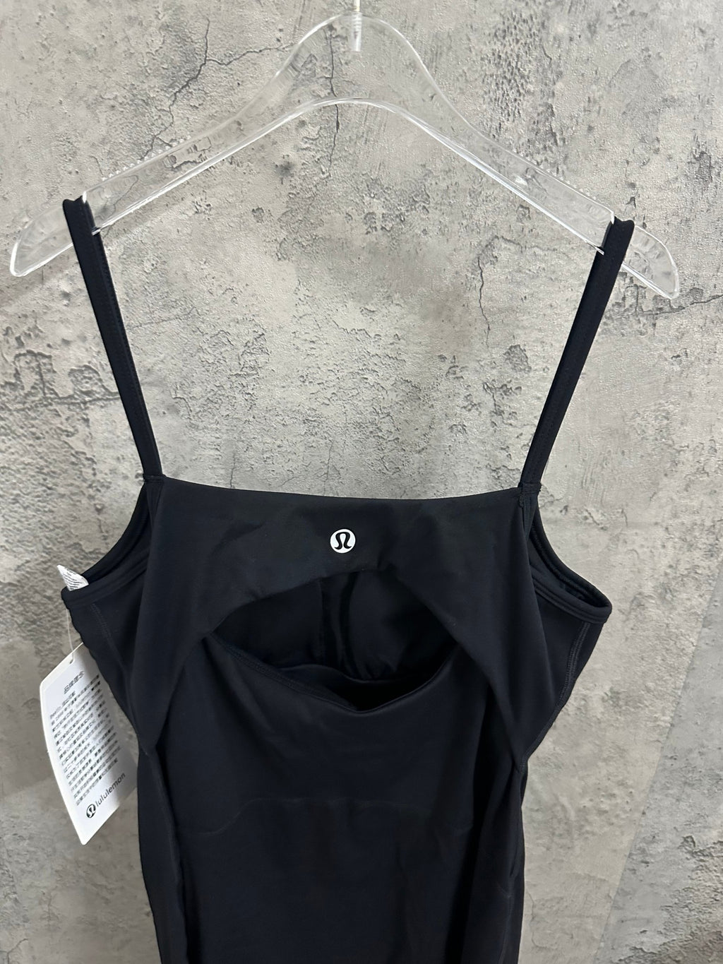 Black spaghetti-strap dress with ruched front bust