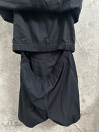 Black sleeveless dress with ruched waistband and drawstring