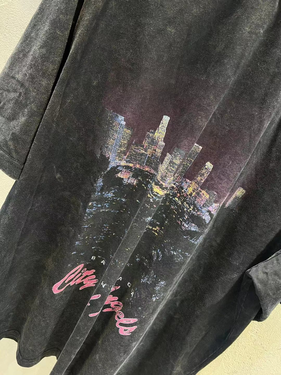 Charcoal T-shirt front graphic close-up with skyline and cursive lettering
