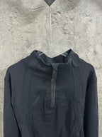 Ralph Lauren hooded outerwear in dark color, front quarter-zip and ribbed drawcord hood