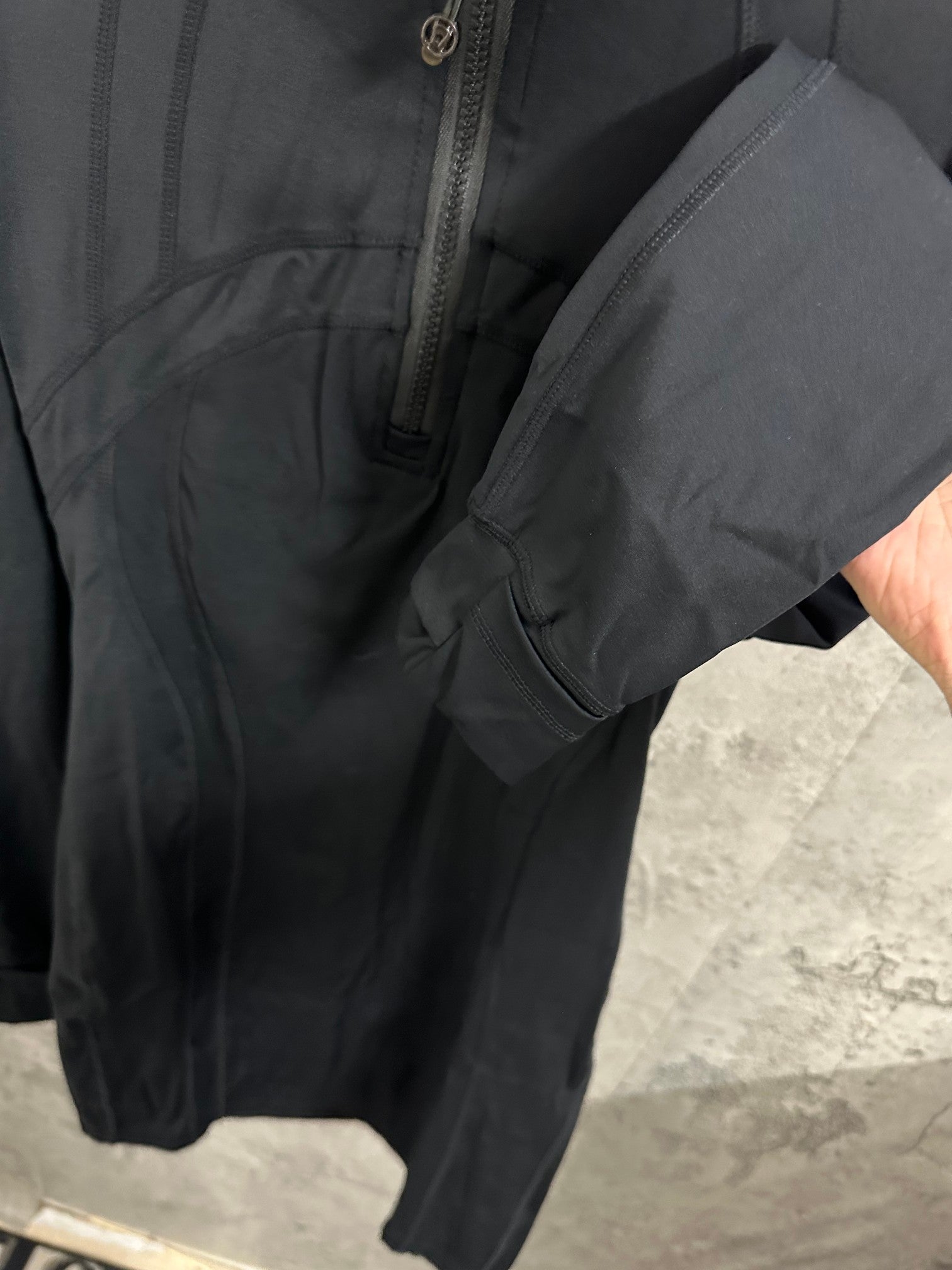 Ralph Lauren hooded outerwear in dark color, side seam and sleeve cuff detail