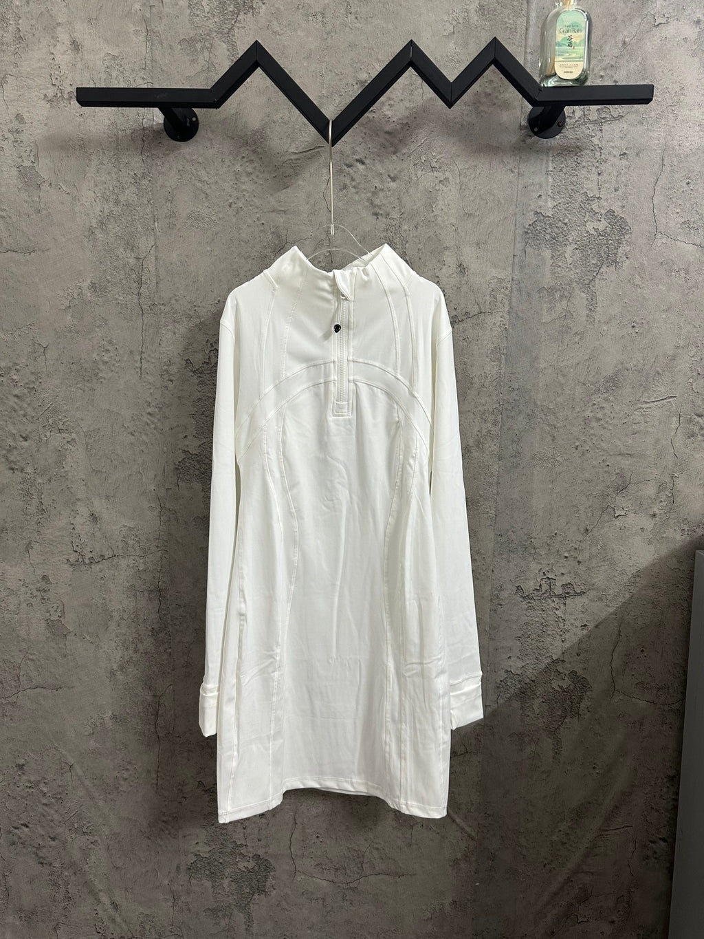 White long-sleeve shirt dress with short button placket at neckline