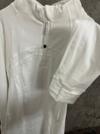 White shirt dress close-up of front placket and curved panel seams