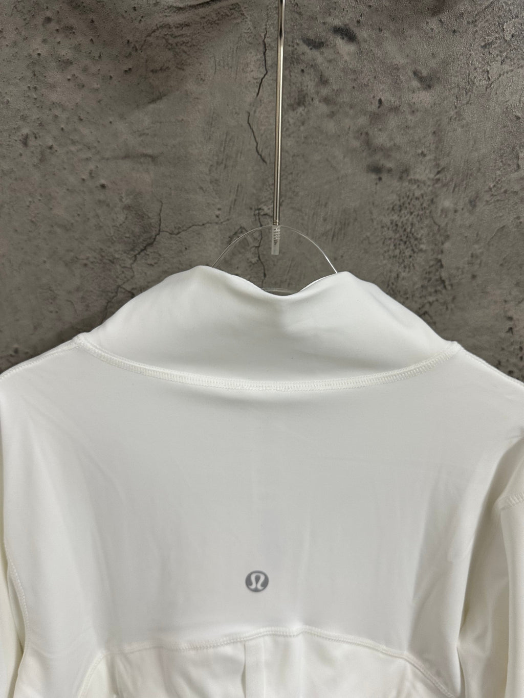 White shirt dress back view with stand collar and centered yoke panel