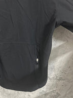 Black hooded jacket side seam and concealed zipper pocket