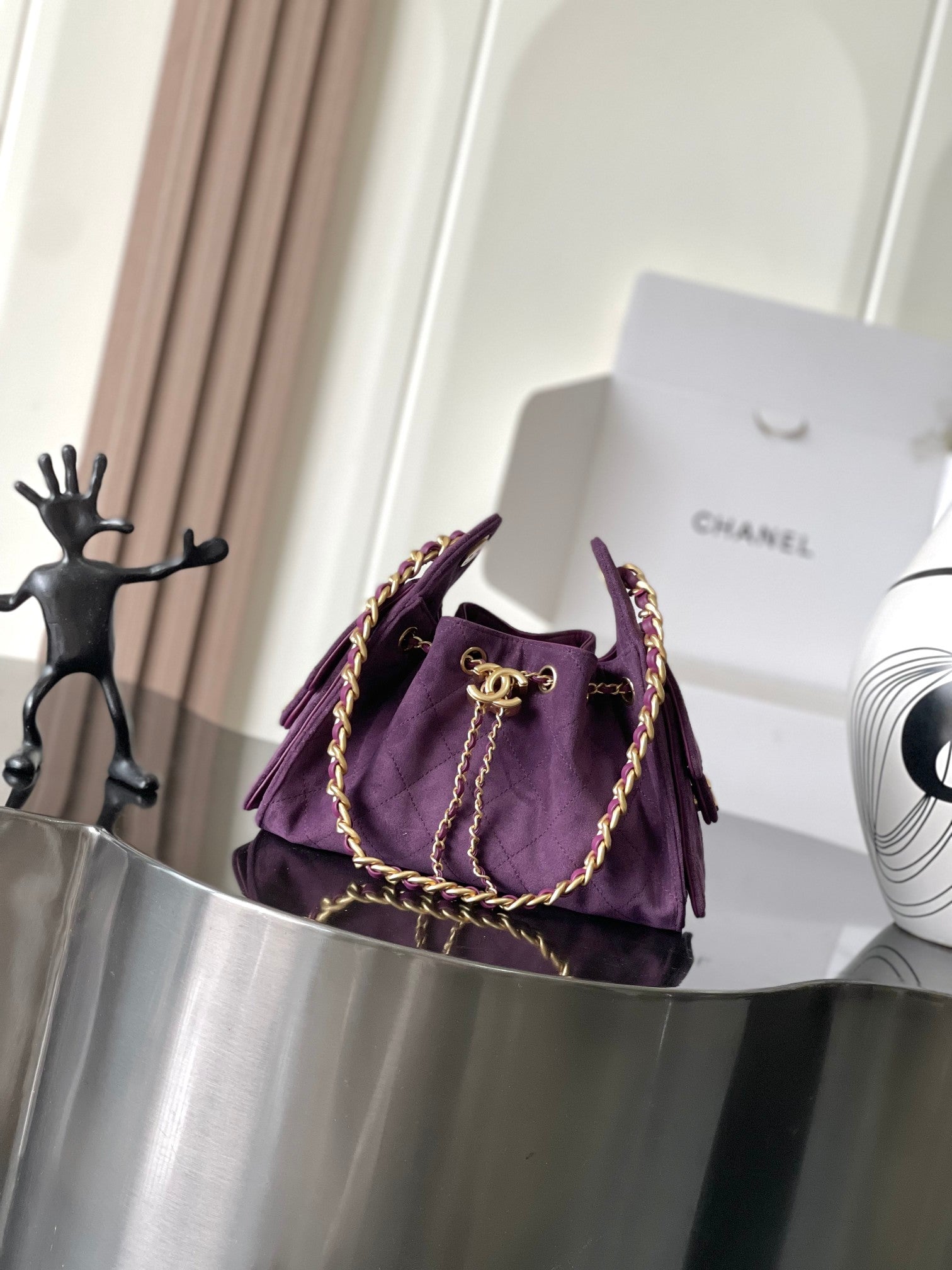 Purple Chanel shoulder bag with gold chain strap, front view