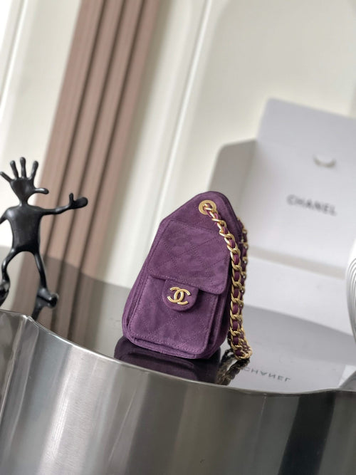 Purple Chanel flap bag with gold chain strap and clasp, side view