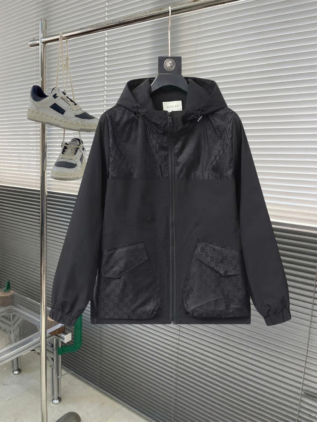 Gucci hooded jacket in dark black with full front zipper and flap pockets