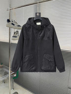 Gucci hooded jacket in dark black with full front zipper and flap pockets