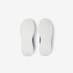 Burberry sneakers outsole view with tread pattern and white rubber base