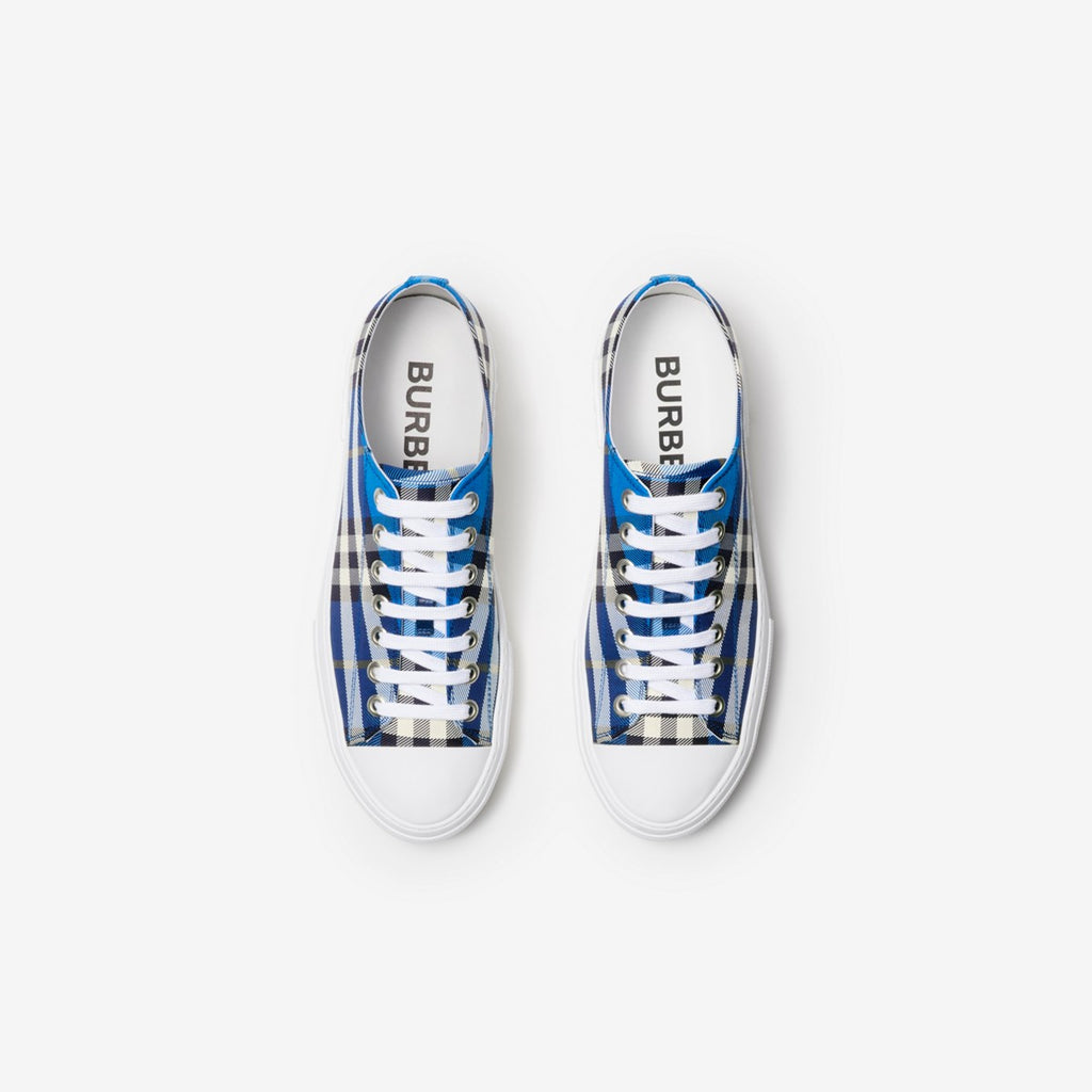 Blue plaid lace-up sneakers with white rubber sole and Burberry logo on tongue