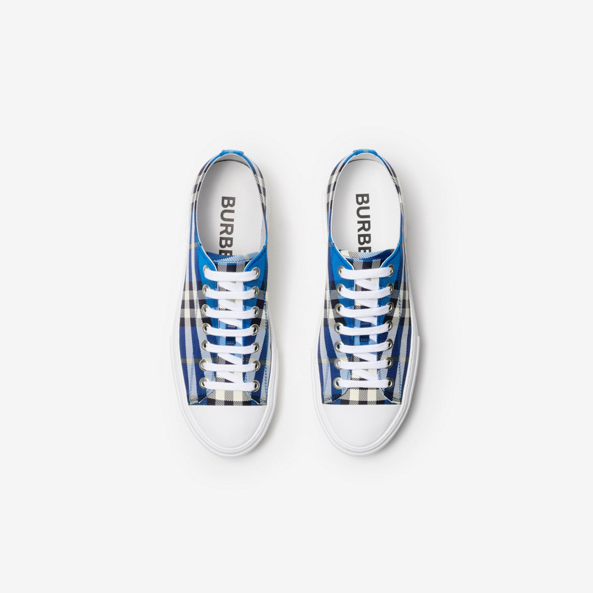 Blue plaid lace-up sneakers with white rubber sole and Burberry logo on tongue