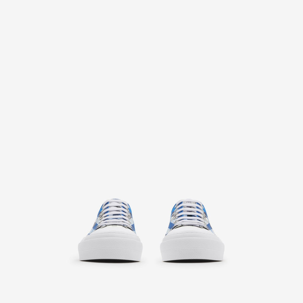 Blue plaid lace-up sneakers front view, white toe cap and rubber sole