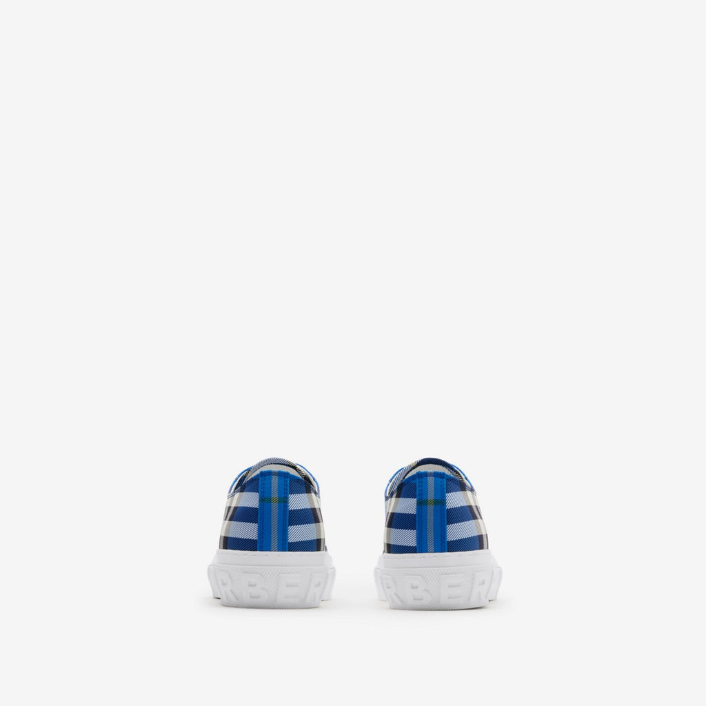 Back view of blue and white plaid low-top sneakers with white heel counter