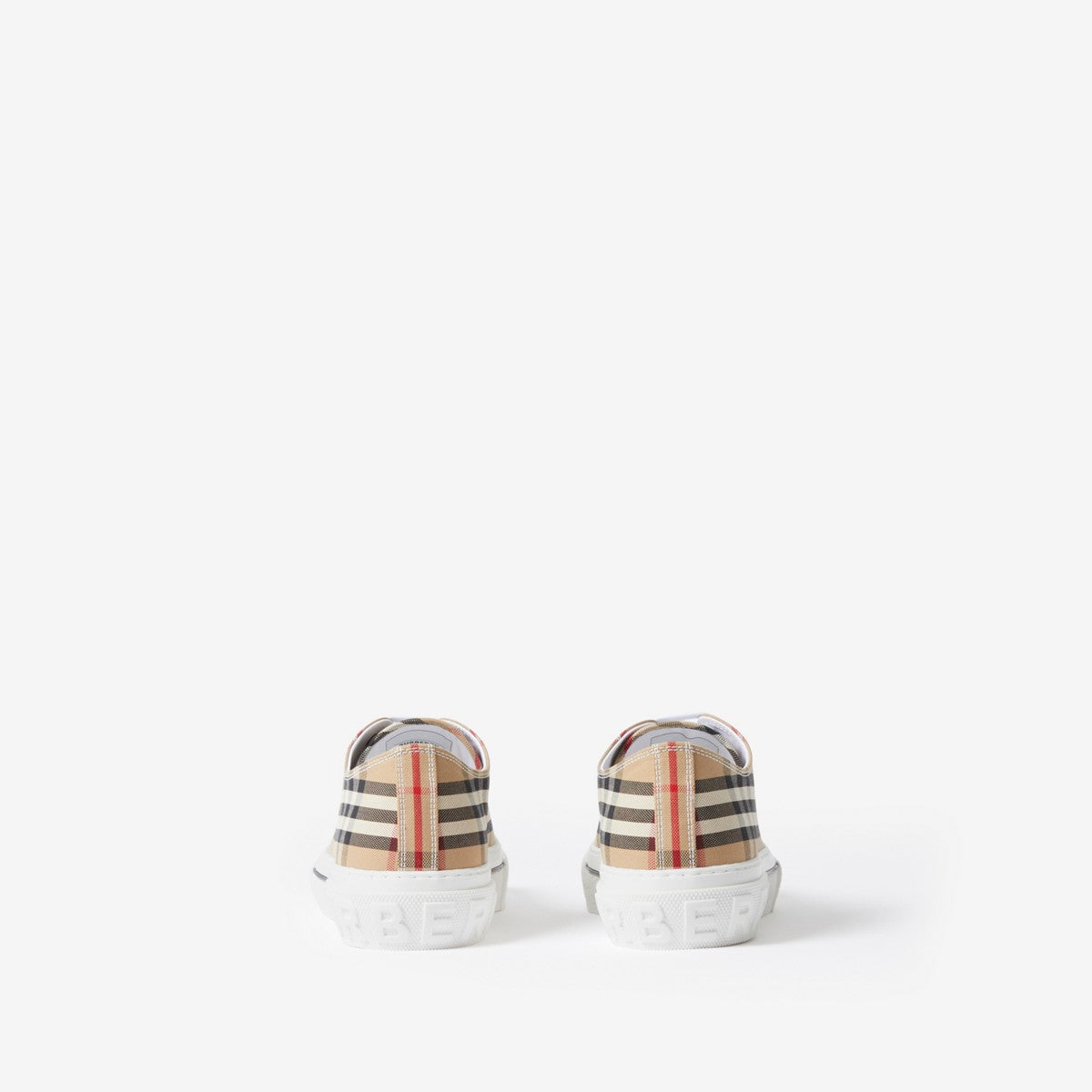 Pair of low-top sneakers, beige plaid heel panels with embossed sole text