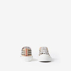 Low-top sneakers with beige plaid fabric and white rubber toe cap
