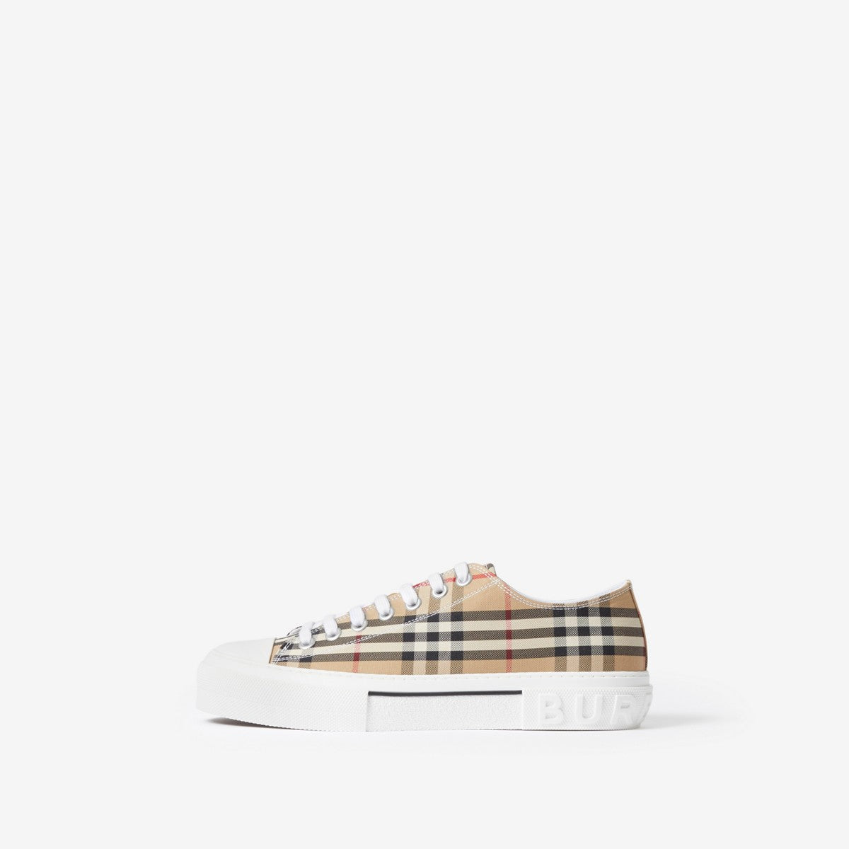 Low-top sneakers with beige plaid canvas upper and white sole with logo lettering