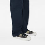 Check-pattern low-top sneakers with black laces and white rubber sole