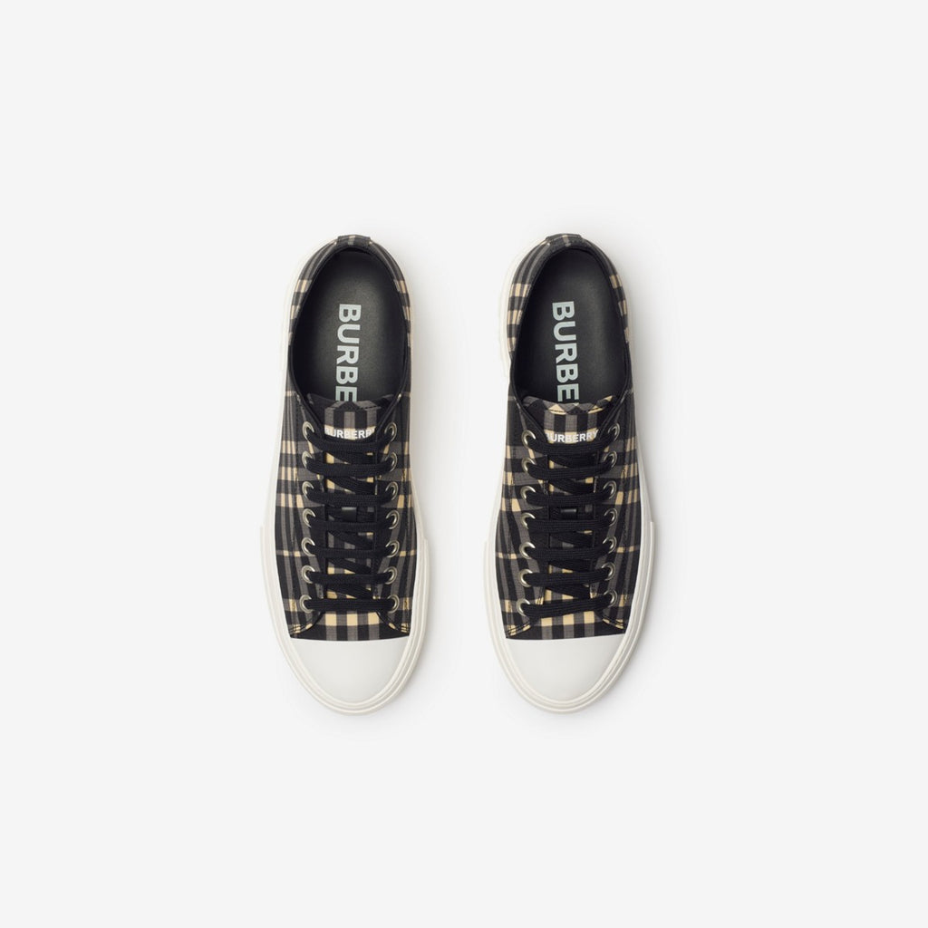 Burberry sneakers with black check upper and side logo, white sole