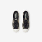 Burberry sneakers with black check upper and side logo, white sole