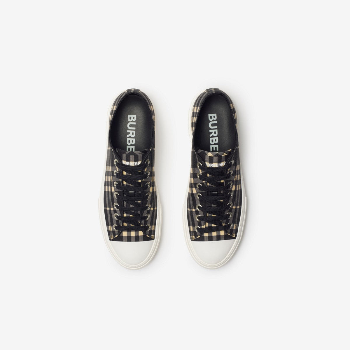Burberry sneakers with black check upper and side logo, white sole