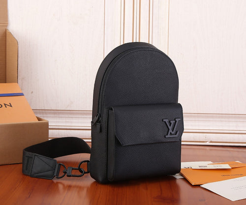 Men's Louis Vuitton mini sling bag, black textured leather, side strap and LV emblem.