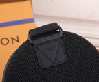 Men's Louis Vuitton mini sling bag label close-up, embossed text on strap patch.
