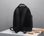Louis Vuitton men’s black leather backpack with back mesh panel and padded shoulder straps