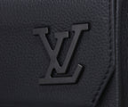 Louis Vuitton men’s black leather backpack with embossed LV logo on front panel