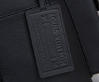 Louis Vuitton men’s black leather backpack with rectangular brand patch on side