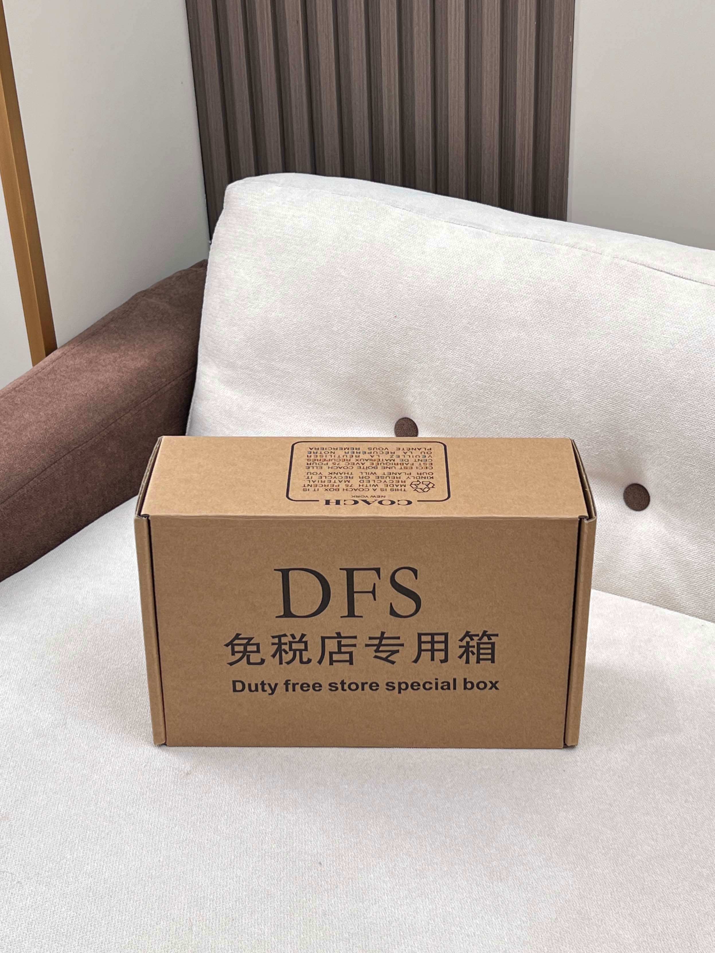 Coah bag packaging box with DFS label and duty free store special box text