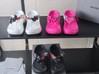 Set of sandals in white and hot pink with bow straps and heart patches