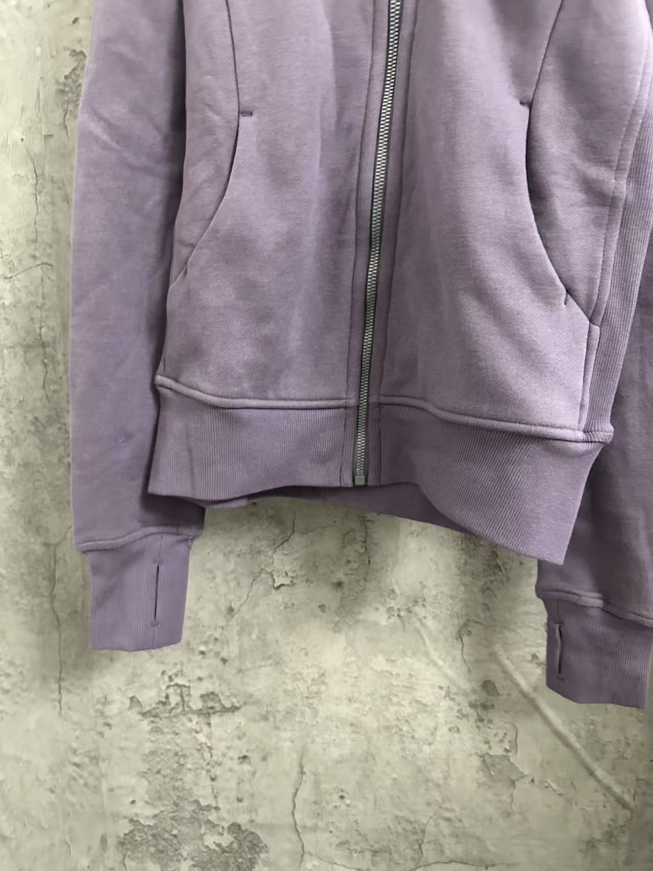 Ralph Lauren purple zip-up hoodie with front pockets and ribbed hem