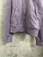 Purple zip-up hoodie front with kangaroo pocket and ribbed cuffs