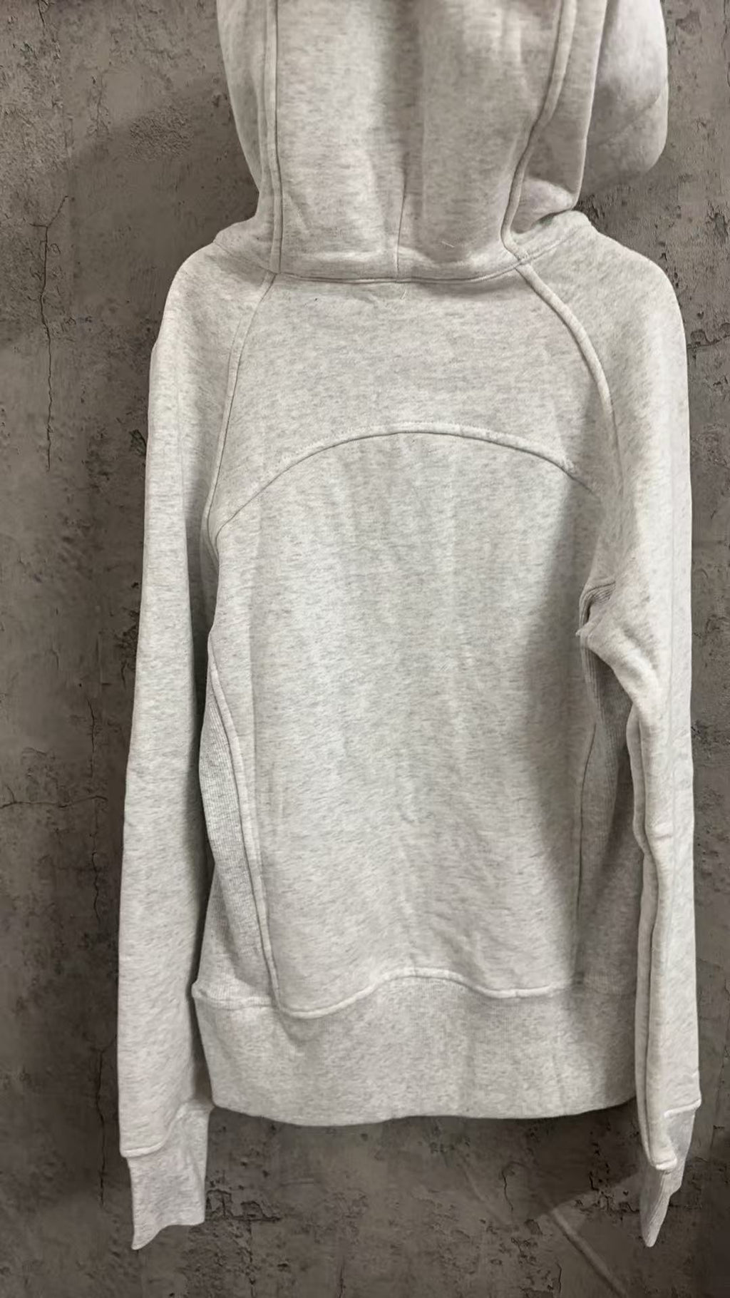 Heather gray zip-up hoodie with kangaroo pocket and drawstring hood