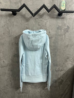 Light blue hoodie with hood and kangaroo pocket, back view