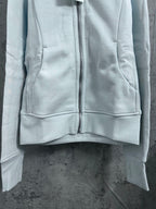 Light blue full-zip hoodie with front pockets
