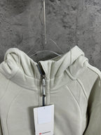 Off-white zip-up hoodie hood with metal zipper and drawstring detail