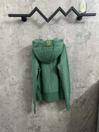 Green hooded zip hoodie with small yellow crest on the hood
