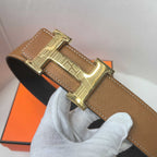 Brown leather belt with gold buckle and front keeper strap