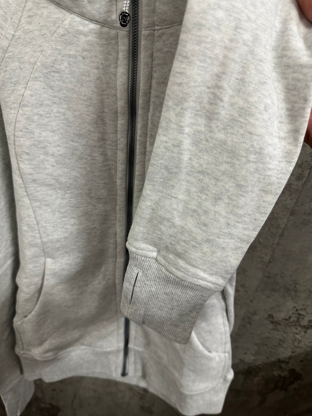 Ralph Lauren zip hoodie sleeve and pocket, light gray, ribbed cuffs, vertical zipper