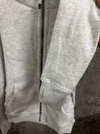 Ralph Lauren zip hoodie sleeve and pocket, light gray, ribbed cuffs, vertical zipper
