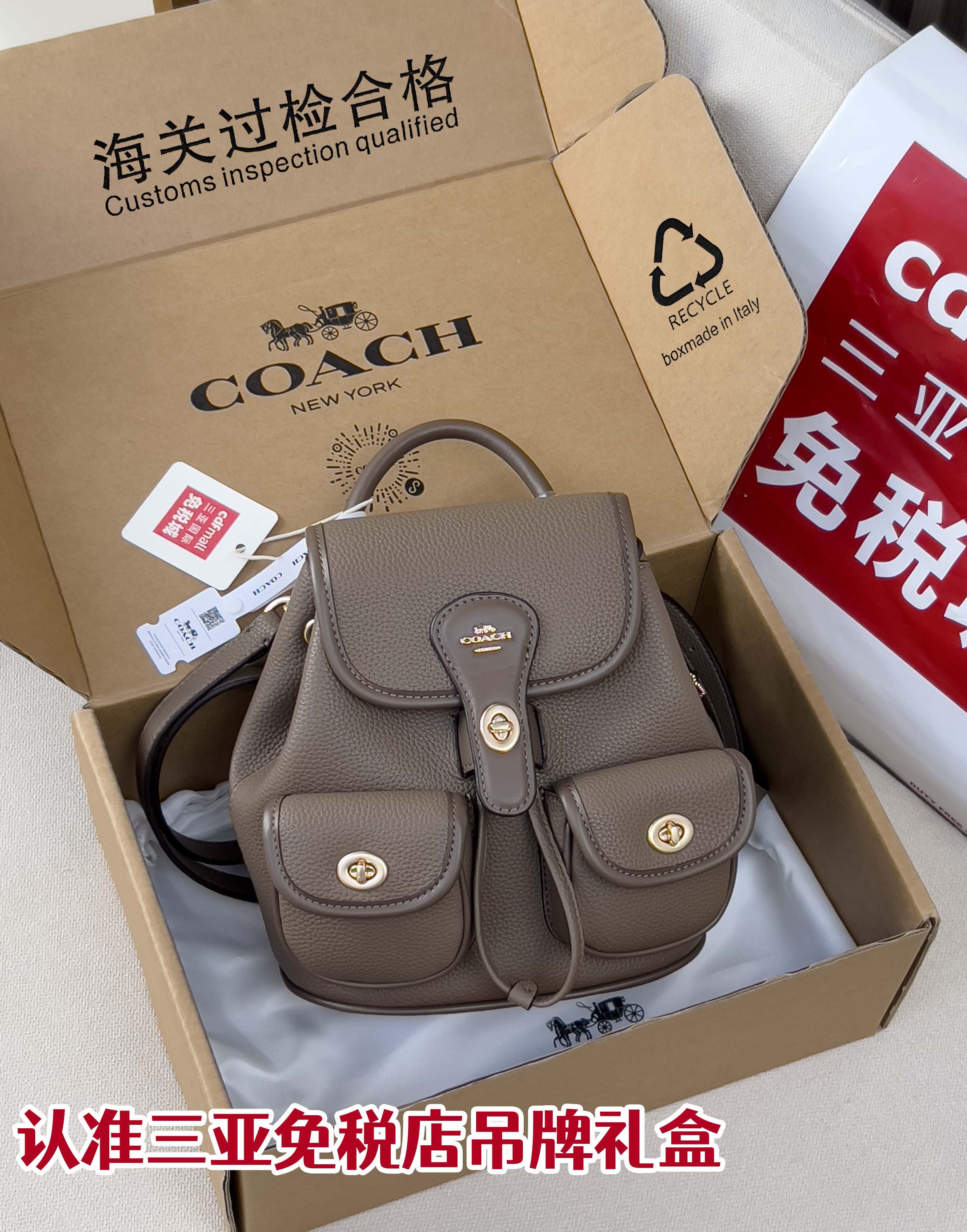 Coach mini backpack bag in taupe pebbled leather, front flap and small pockets