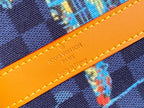 Orange leather trim with embossed “LOUIS VUITTON” text and yellow contrast stitching.