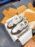 Louis Vuitton trainer sneakers, white uppers with brown trim and blue accent lace