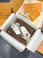 Louis Vuitton trainer sneakers with brown outsole and white leather upper