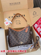 Coah monogram crossbody bag, dark brown with tan trim and gold-tone hardware
