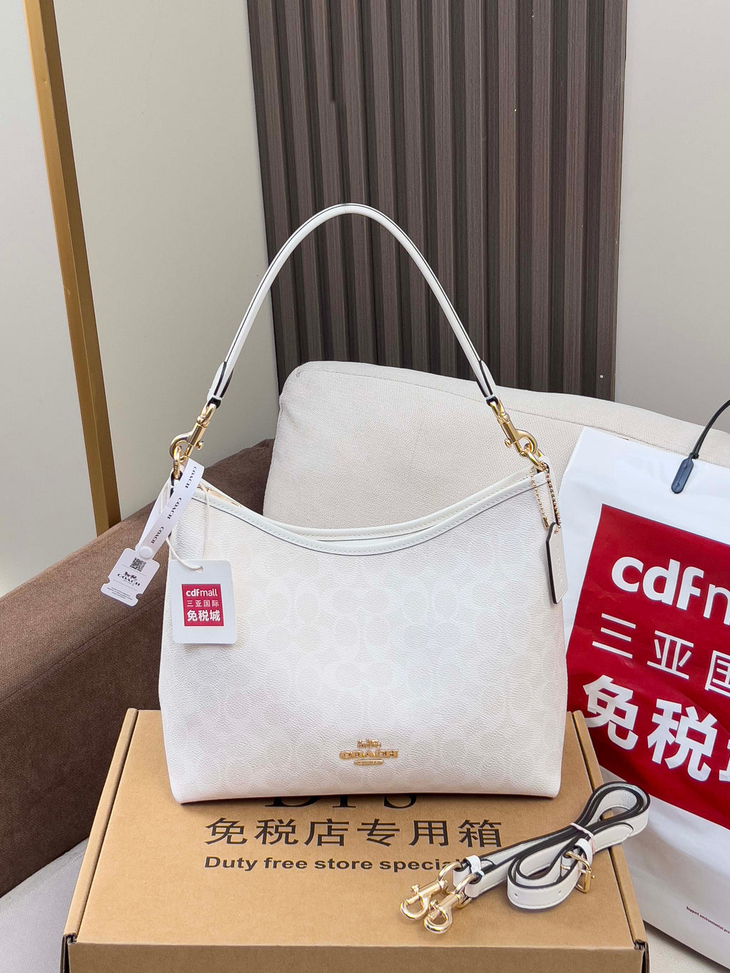 Coah handbag, light gray patterned canvas with gold chain shoulder strap